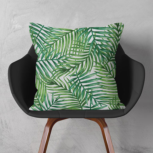 Kissen mit exotischen Blättern